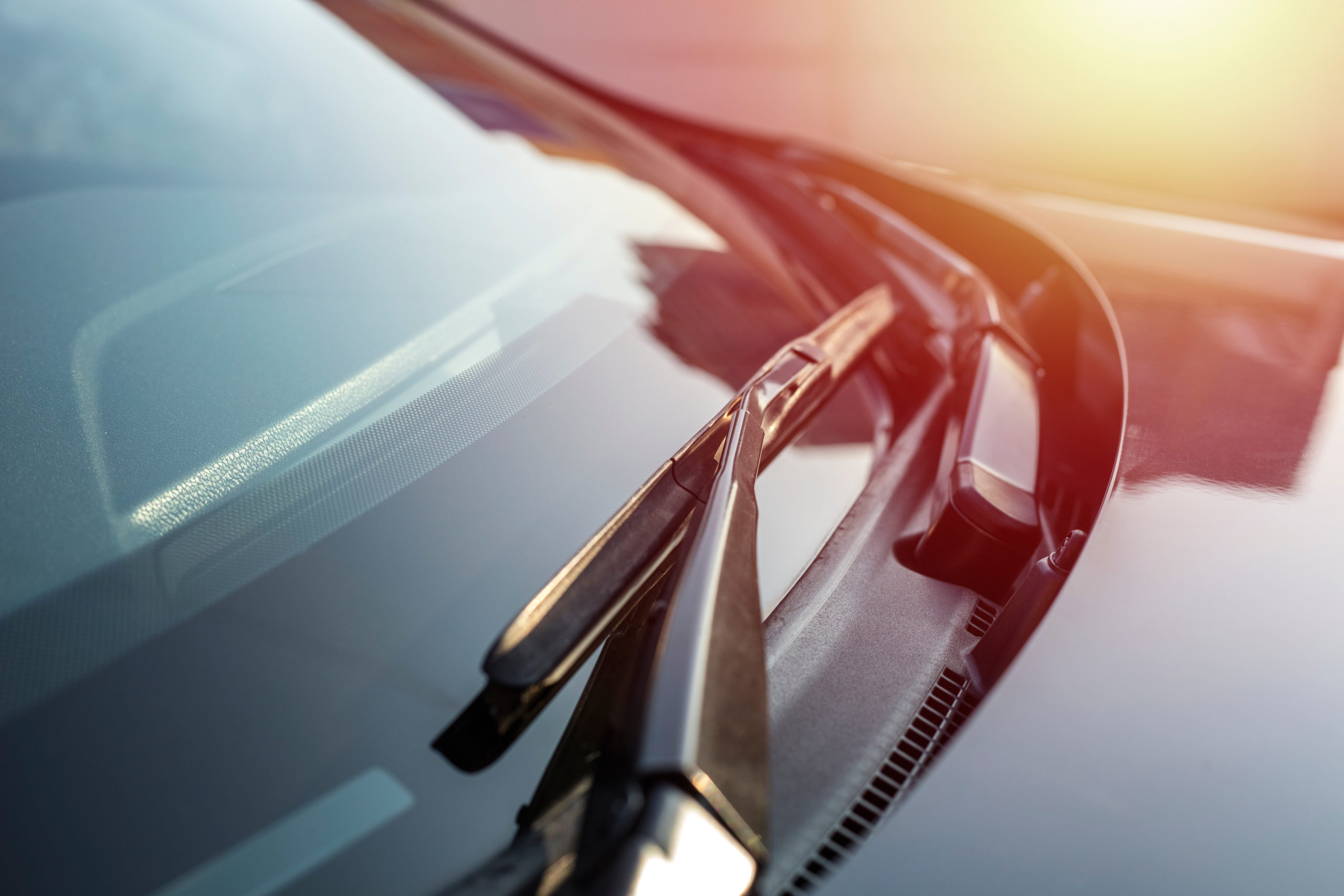 Windshield Repair in Powhatan, VA Brushes on the car glass in the evening